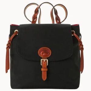 Dooney & Bourke Nylon Flap Backpack. Black outside, red inside.